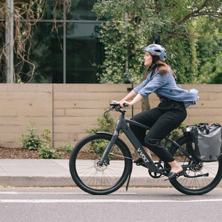 A woman commuting by Vvolt electric bike. 